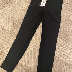 Black pencil pant. Honeycomb detail & zip ankle.